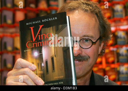 (dpa) - German author Michael Boeckler smiles at the Frankfurt Book Fair 2005 in Frankfurt Main, Germany, Wednesday 19 October 2005. Photo: Uwe Zucchi Stock Photo