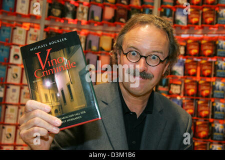 (dpa) - German author Michael Boeckler smiles at the Frankfurt Book Fair 2005 in Frankfurt Main, Germany, Wednesday 19 October 2005. Photo: Uwe Zucchi Stock Photo