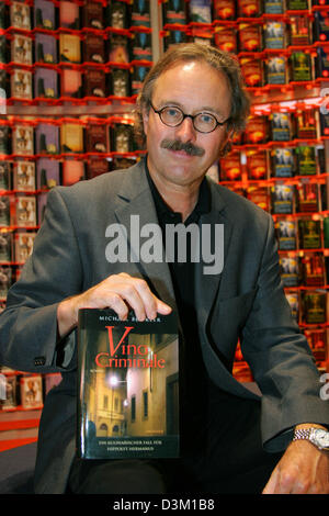 (dpa) - German author Michael Boeckler smiles at the Frankfurt Book Fair 2005 in Frankfurt Main, Germany, Wednesday 19 October 2005. Photo: Uwe Zucchi Stock Photo