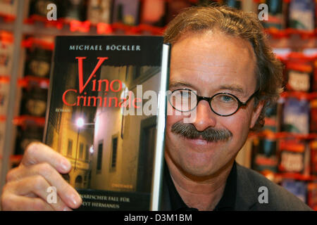 (dpa) - German author Michael Boeckler smiles at the Frankfurt Book Fair 2005 in Frankfurt Main, Germany, Wednesday 19 October 2005. Photo: Uwe Zucchi Stock Photo