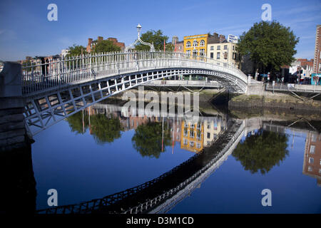 Reflection of Ha'penny Bridge in the River Liffey, Dublin city, County Dublin, Ireland. Stock Photo