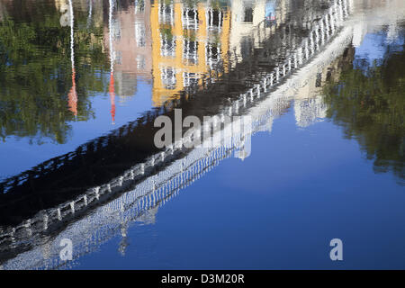 Reflection of Ha'penny Bridge in the River Liffey, Dublin city, County Dublin, Ireland. Stock Photo