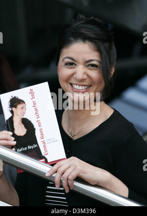 (dpa) - Turkish born journalist and author Hatice Akyuen presents her title 'One Hans with hot sauce!' at the Frankfurt Book Fair in Frankfurt, Germany, 22 October 2005. Photo: Frank May Stock Photo
