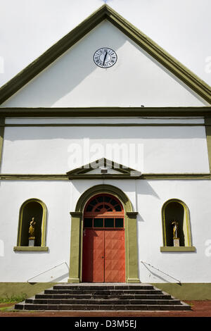 The front facade of a church on the road between Sainte Anne and Sainte Rose on the French island of Reunion, Indian Ocean Stock Photo
