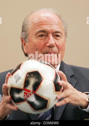 (dpa) - Joseph Blatter, President of FIFA, holds a soccer ball in his hands after a press conference at the fair centre in Leipzig, Germany, Wednesday, 07 December 2005. The preparations for the 2006 World Cup final round draw, on Friday, 09 December 2005, are in full swing. Around 4,000 invited guest, including 1,500 journalists, are expected to attend the event in Leipzig. Photo: Stock Photo