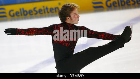 (dpa) - German figure skater Stefan Lindemann (25) perform in the men's free skating competition at the German Championships in Figure Skating in Berlin, Friday, 30 December 2005. Lindemann took his fifth title, but is still required to improve for the European championships in Lyon end of January. Photo: Michael Hanschke Stock Photo