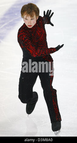 (dpa) - German figure skater Stefan Lindemann (25) performs in the men's free skating competition at the German Championships in Figure Skating in Berlin, Friday, 30 December 2005. Lindemann took his fifth title, but is still required to improve for the European championships in Lyon end of January. Photo: Michael Hanschke Stock Photo