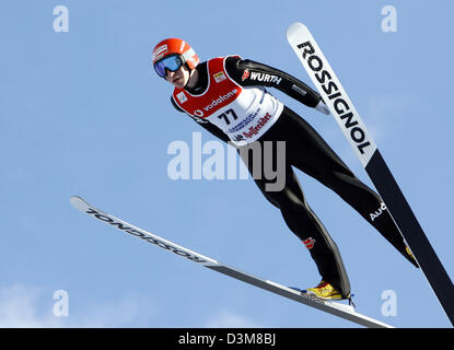 (dpa) - German ski jumper Michael Uhrmann flies from the Olympic ski jumping hill during the practice for the 2nd jump of the 54th Four Hills Tournament in Garmisch-Partenkirchen, Germany, 31 December 2005. Photo: Peter Kneffel Stock Photo