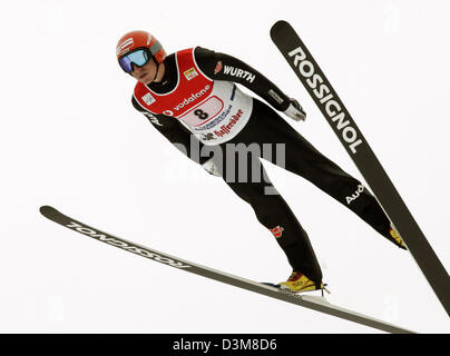 (dpa) - German ski jumper Michael Uhrmann pictured airborne during his jump at the New Year's Jump event of the 54th FIS Four Hills Tournament in Garmisch-Partenkirchen, Germany, 1 January 2006. The starters are on very equal level in this year's traditional competition, at least ten of them have potential for the victory. The German team is going to improve its performance in the  Stock Photo