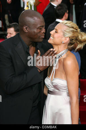 (dpa) - British singer Seal and his wife German topmodel Heidi Klum kiss at the 63rd Annual Golden Globe Awards at the Beverly Hilton Hotel in Los Angeles, USA, 16 January 2006. Photo: Hubert Boesl Stock Photo