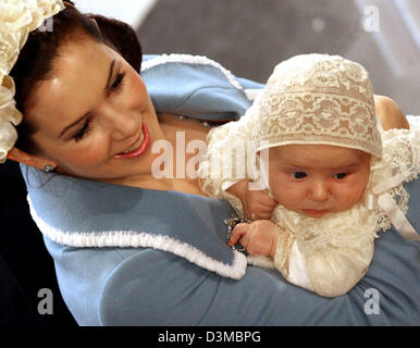 Danish Crown Princess Mary holds her baby son in her arms and smiles after the baptism ceremony at the chapel of Castle Christianborg on Copenhagen, Denmark, Saturday, 21 January 2006. Princess Mary's and Prince Frederik's  three-months old baby was baptised Prince Christian and is following his father Crown Prince Frederik as second in line to succeed to the Danish throne. Members Stock Photo
