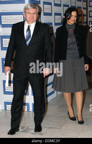 Former German Foreign Minister Joschka Fischer (L) and his wife Minu Barati arrive for the award ceremony for the German Media Prize 2005 at the convention in Baden-Baden, Germany, Tuesday, 24 January 2006. Fischer held the honourific speech in honour of Bono, the lead singer of the Irish rock band U2, who was awarded with the German Media Prize for his humanitarian committments an Stock Photo