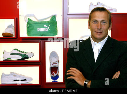 Sporting goods company Puma AG chairman Jochen Zeitz stands in front of some of the company's products prior to the balance press conference in Nuremberg, Germany, Friday 10 February 2006. According to Zeitz the company achieved record results in the business year 2005. Photo: Daniel Karmann Stock Photo