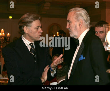 British musician and Live-8-founder Sir Bob Geldof (L) chats with US actor Christopher Lee at the 'Cinema for Peace' event in the concert hall at the Gendarmenmarkt in Berlin, Germany, 13 Feburary 2006. The gala took place on the occasion of the 56th International Film Festival Berlinale. Photo: Jens Kalaene Stock Photo