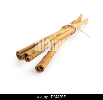 long cinnamon sticks isolated on white background Stock Photo