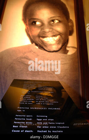 The picture shows a photograph of a murdered 12-year old girl at the National Genocide Memorial Centre in Kigali, capital of Rwanda, 15 January 2006. The information panel reads that she was killed with a machete. 12 years after the genocide in 1994, when 800.000 got killed in a 100 day massacre between the ethnic groups of the Tutsi (12%) and Hutu (86%), life slowly normalises. Th Stock Photo