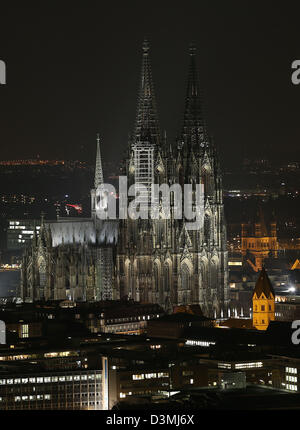 A view of the illuminated city centre at night and Cologne Cathedral (C) in Cologne, Germany, 18 February 2013. Photo: Oliver Berg/dpa Stock Photo