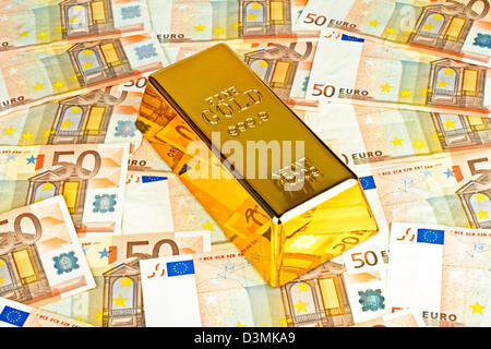 Gold bar and euro money Stock Photo