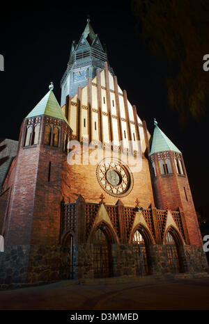 gothic church with tower in Poznan by night, Poland Stock Photo