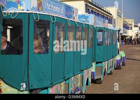 The home of Peppa Pig world - Landtrain taking passengers along the promenade at Bournemouth in February Stock Photo