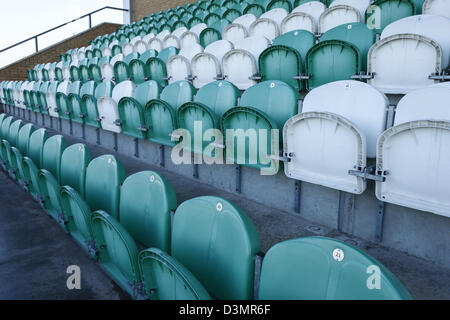 White and green plastic stadium seating Stock Photo