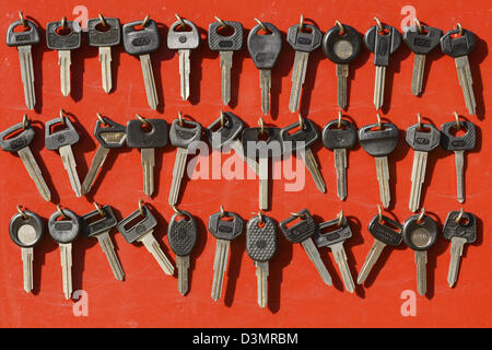 Car keys hanging on a key holder Stock Photo - Alamy