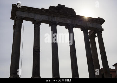 Surviving columns of the Temple of Saturn in the Imperial Forum in Rome Italy Stock Photo