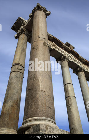 Surviving columns of the Temple of Saturn in the Imperial Forum in Rome Italy Stock Photo