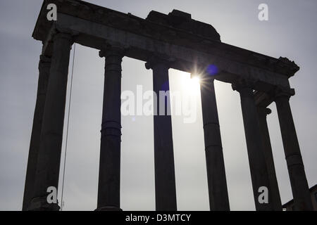 Surviving columns of the Temple of Saturn in the Imperial Forum in Rome Italy Stock Photo