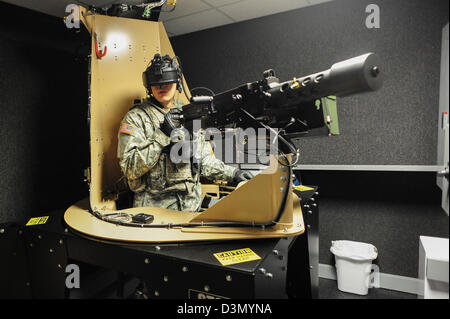 US Army soldiers train using the Dismounted soldier Training System February 21, 2013 at Grafenwoehr, Germany. The DSTS is the first fully-immersive virtual reality training system which simulates a combat environment. Stock Photo
