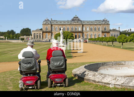 Disabled visitors at Wrest Park, Silsoe, Bedfordshire. A 90 acre park and gardens with a French-style mansion. Stock Photo