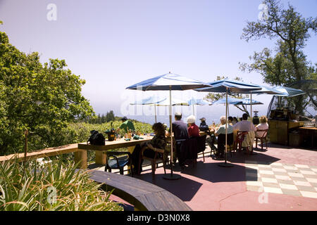 The historic and ever-popular restaurant Nepenthe occupies a Big Sur bluff overlooking the Pacific, California, USA Stock Photo
