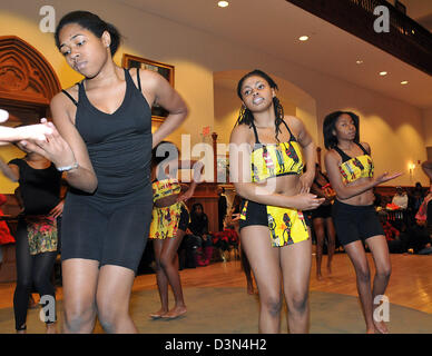 Teenage girls perform a traditional African dance during a Kwanzaa celebration in New Haven CT USA Stock Photo