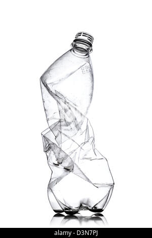 smashed empty plastic bottle, isolated on white background Stock Photo