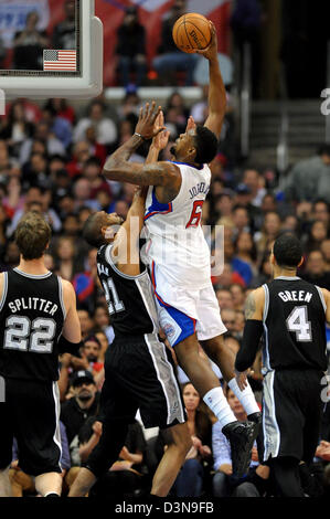 Feb. 21, 2013 - Los Angeles, California, U.S - February 21, 2013: Los Angeles, CA. Los Angeles Clippers center DeAndre Jordan (6) goes up for a slam dunk over San Antonio Spurs power forward Tim Duncan (21) during the NBA game between the between the Los Angeles Clippers and the San Antonio Spurs at Staples Center in Los Angeles, CA. David Hood/CSM. Stock Photo