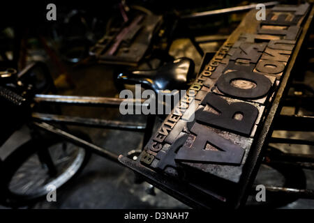 Letterpress types, made of wood, placed in a tray in the vintage print shop in Cali, Colombia. Stock Photo