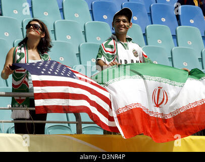 The picture shows fans with the national flags of Iran and the United States of America prior the group D preliminary match of 2006 FIFA World Cup Iran vs. Angola at the FIFA World Cup stadium in Leipzig, Germany, Wednesday, 21 June 2006. Photo: WOLFGANG KUMM +++ Mobile Services OUT +++ Please refer to FIFA's Terms and Conditions. Stock Photo