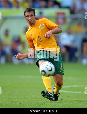 Australian Lucas Neill of Blackburn Rovers kicks the ball during the round of sixteen match of the 2006 FIFA World Cup Italy vs. Australia in Kaiserslautern, Monday 26 june 2006. Italy won 1-0. Photo: Arne Dedert dpa +++ Mobile Services OUT +++ Please also refer to FIFA's Terms and Conditions. Stock Photo