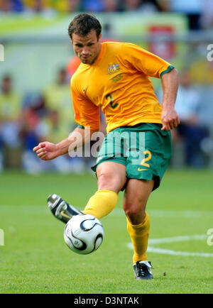 Australian Lucas Neill of Blackburn Rovers kicks the ball during the round of sixteen match of the 2006 FIFA World Cup Italy vs. Australia in Kaiserslautern, Monday 26 june 2006. Italy won 1-0. Photo: Arne Dedert dpa +++ Mobile Services OUT +++ Please also refer to FIFA's Terms and Conditions. Stock Photo