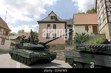 Soldiers of the German Bundeswehr manoeuvre with tanks in the training ...