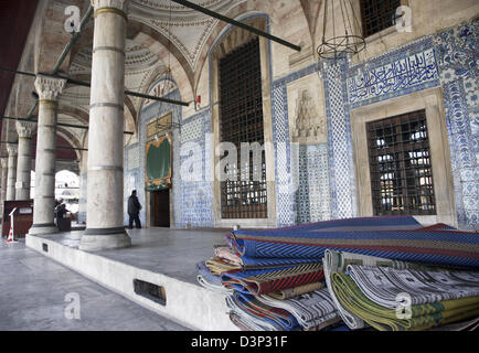 Prayer Mats at the entrance of the Rustem Pasha Camil Ottoman Mosque, Istanbul, Turkey Stock Photo