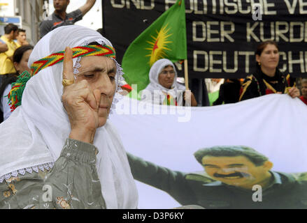 Circa 100 Kurds protest on criminalisation and political persecution of Kurds in Germany in Saarbruecken, Germany, 19 August 2006. The demanded the release of Kurdish politicians and journalists Muzaffer Ayata, Nedim Seven and Riza Erdogan as well as the release of former Kurdistan Workers' Party (PKK) head Abdullah Oecalan. The registered society Kurdish Community in Saarland, mem Stock Photo