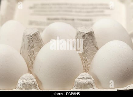 White eggs in carton package Stock Photo