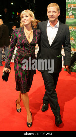 German director Soenke Wortmann (R) and his wife Cecilia appear for the premiere of his latest film 'Deutschland. Ein Sommermaerchen' ('Germany. A summer dream.') at the Berlinale film palace in Berlin, Germany,  Tuesday, 03 October 2006. Wortmann was allowed to follow the German soccer national team with a camera for one year including the World Cup 2006 itself. The film will be s Stock Photo