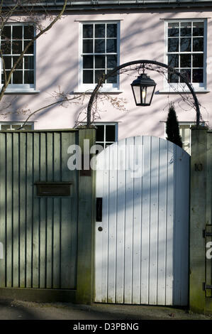 Residential house behind a fence, Hampstead Grove, Hampstead, London, UK Stock Photo