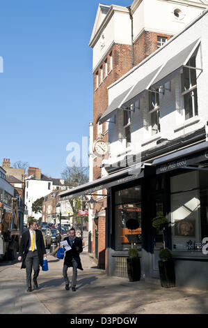 Two men on Heath Street, Hampstead, London, UK Stock Photo