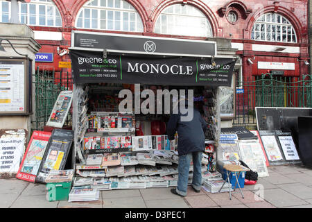 Newsagent's stall outside Belsize Park Underground Station Stock Photo