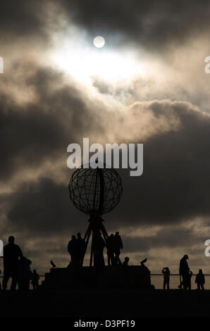 The midnight sun at a stormy Northcape in Northern Norway Stock Photo