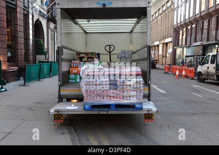 Delivery van delivering a palette of soft drinks, UK Stock Photo