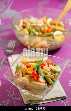 Pasta shells salad with basil. Recipe available. Stock Photo